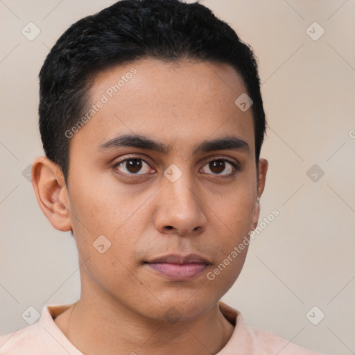 Neutral latino young-adult male with short  black hair and brown eyes