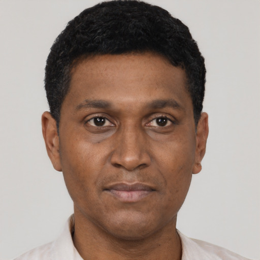 Neutral black young-adult male with short  black hair and brown eyes