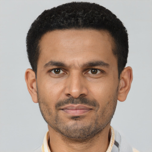 Neutral latino young-adult male with short  black hair and brown eyes