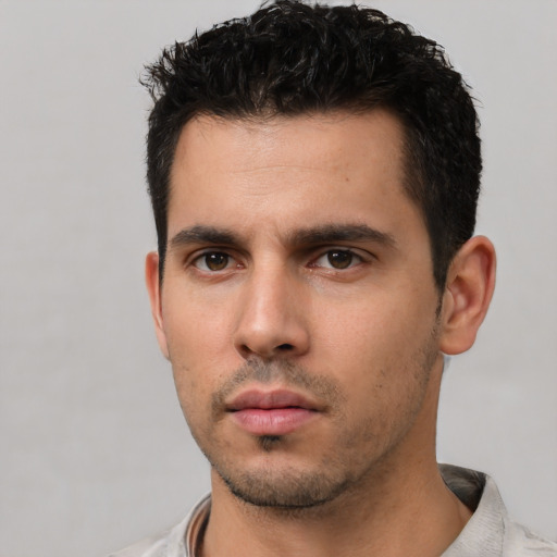 Neutral white young-adult male with short  black hair and brown eyes