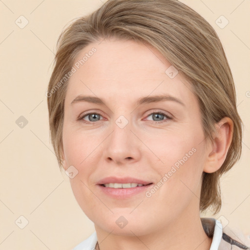 Joyful white young-adult female with medium  brown hair and blue eyes