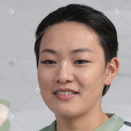 Joyful asian young-adult female with short  brown hair and brown eyes