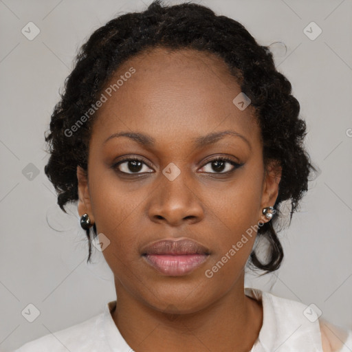 Neutral black young-adult female with medium  brown hair and brown eyes