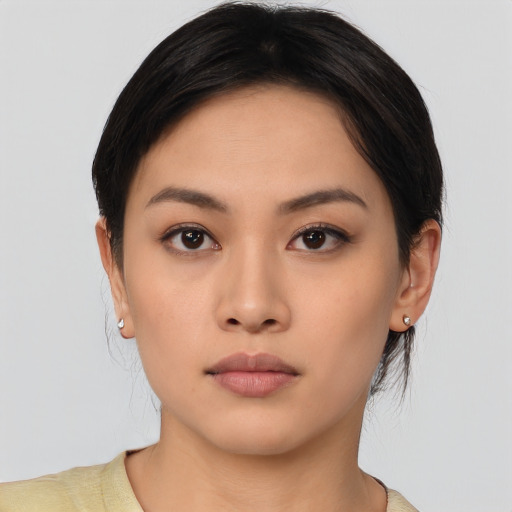 Neutral asian young-adult female with medium  black hair and brown eyes