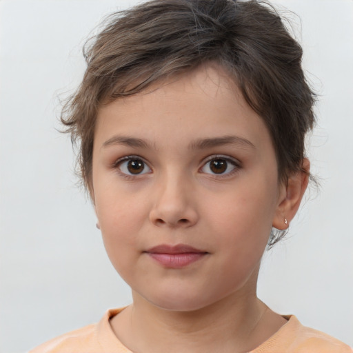 Joyful white child female with medium  brown hair and brown eyes