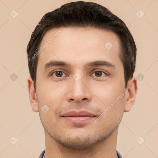 Joyful white young-adult male with short  brown hair and brown eyes