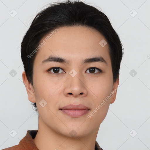 Joyful asian young-adult male with short  brown hair and brown eyes