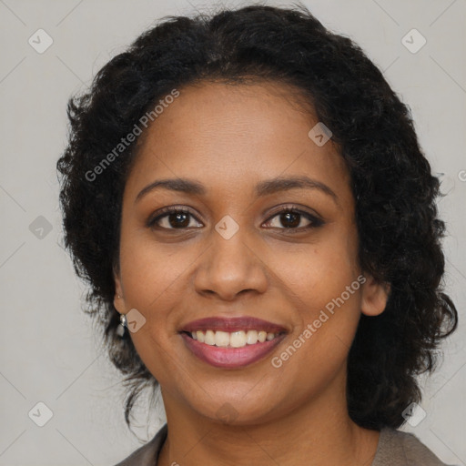 Joyful black young-adult female with medium  brown hair and brown eyes