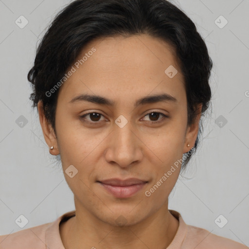 Joyful latino young-adult female with short  brown hair and brown eyes