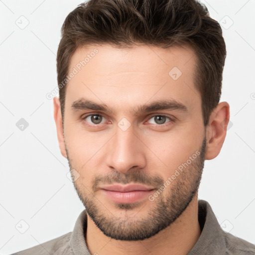 Neutral white young-adult male with short  brown hair and brown eyes