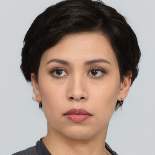 Neutral asian young-adult female with medium  black hair and brown eyes