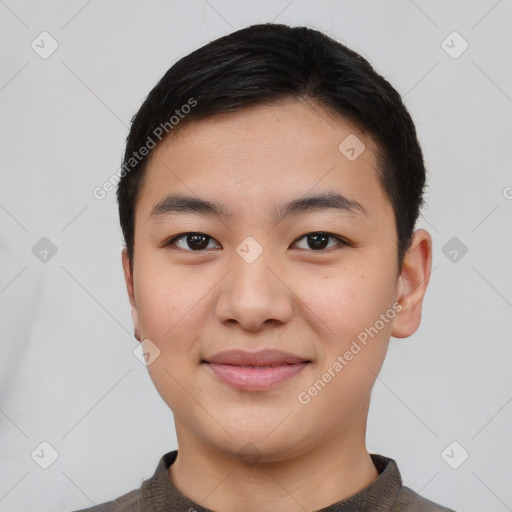 Joyful asian young-adult female with short  black hair and brown eyes