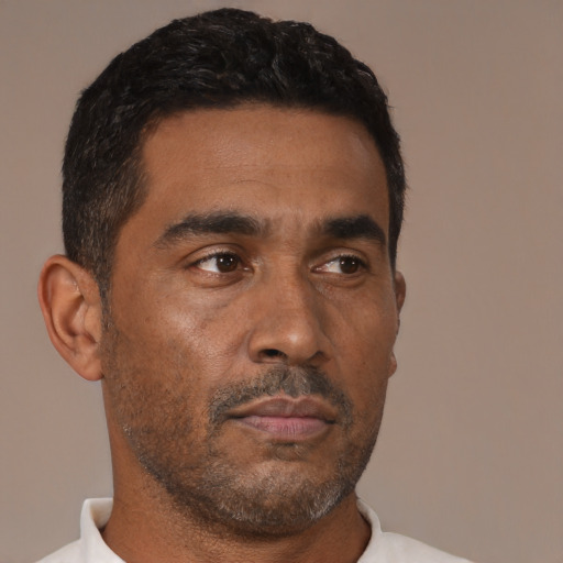 Neutral black adult male with short  black hair and brown eyes