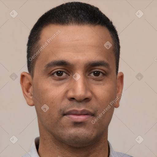 Neutral latino young-adult male with short  black hair and brown eyes