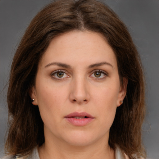 Neutral white young-adult female with medium  brown hair and brown eyes