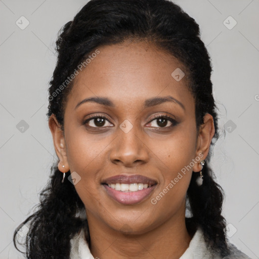 Joyful latino young-adult female with long  black hair and brown eyes