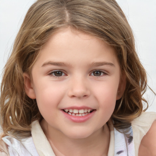 Joyful white child female with medium  brown hair and brown eyes