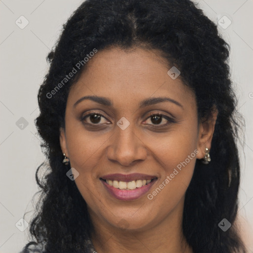 Joyful latino young-adult female with long  brown hair and brown eyes
