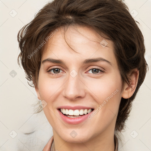 Joyful white young-adult female with medium  brown hair and green eyes