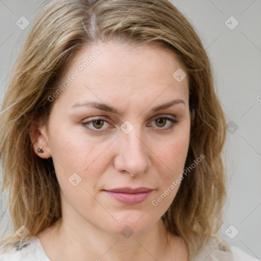 Joyful white young-adult female with medium  brown hair and green eyes