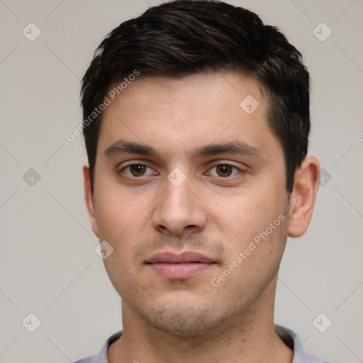 Neutral white young-adult male with short  brown hair and brown eyes