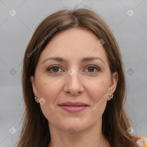 Joyful white adult female with long  brown hair and brown eyes