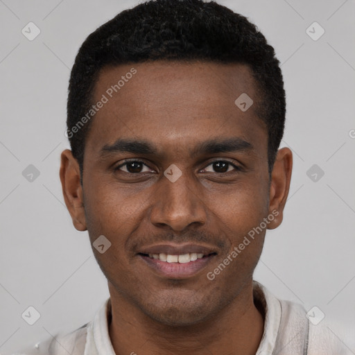 Joyful black young-adult male with short  black hair and brown eyes
