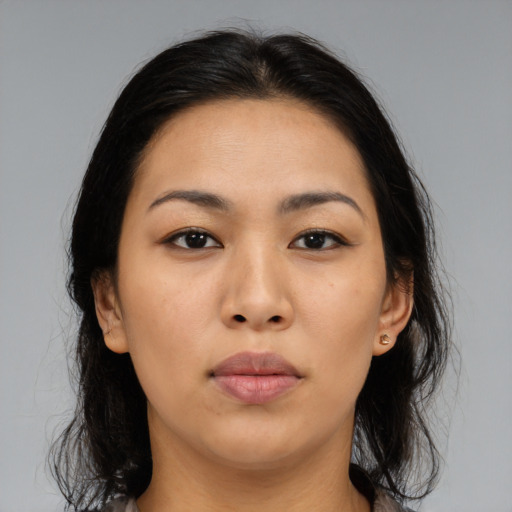 Neutral asian young-adult female with medium  brown hair and brown eyes
