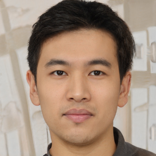 Neutral asian young-adult male with short  brown hair and brown eyes
