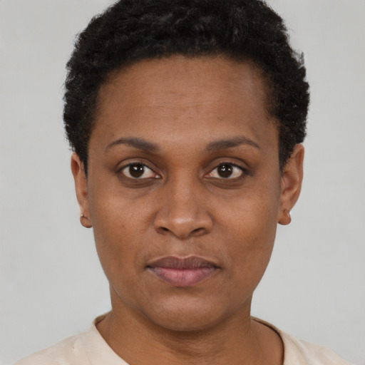 Neutral black young-adult female with short  black hair and brown eyes