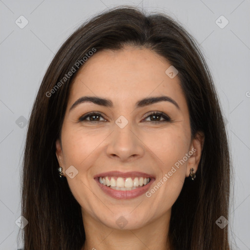 Joyful white young-adult female with long  brown hair and brown eyes