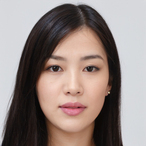 Neutral asian young-adult female with long  brown hair and brown eyes