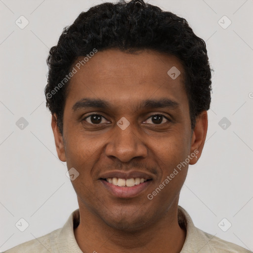 Joyful black young-adult male with short  black hair and brown eyes