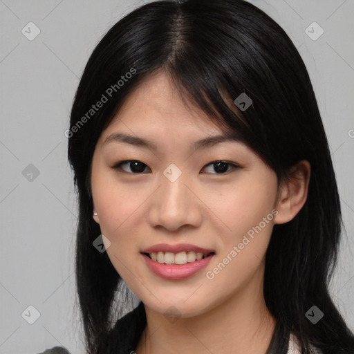 Joyful asian young-adult female with medium  black hair and brown eyes