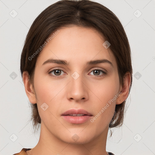 Neutral white young-adult female with medium  brown hair and brown eyes