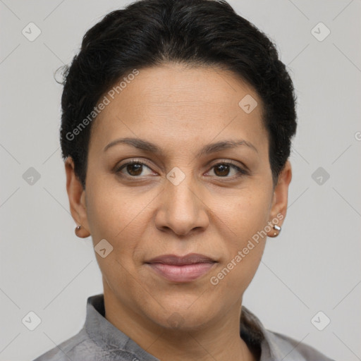 Joyful latino adult female with short  brown hair and brown eyes