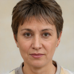 Joyful white adult female with short  brown hair and brown eyes