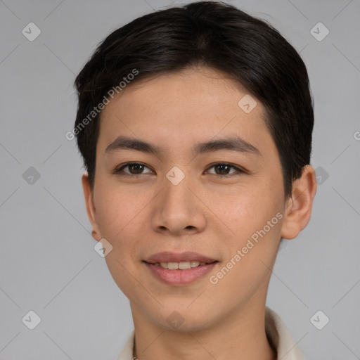 Joyful asian young-adult male with short  brown hair and brown eyes