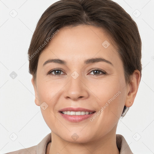 Joyful white young-adult female with short  brown hair and brown eyes