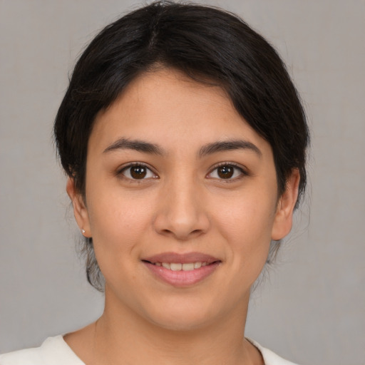 Joyful white young-adult female with medium  brown hair and brown eyes