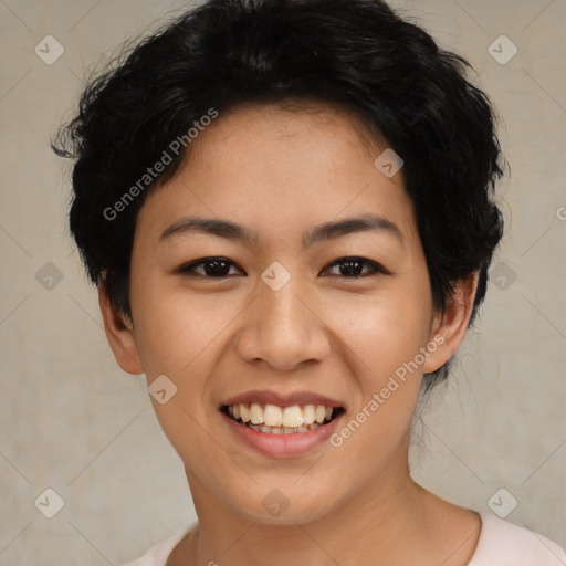 Joyful asian young-adult female with short  black hair and brown eyes