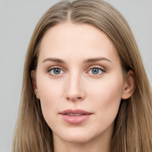 Neutral white young-adult female with long  brown hair and grey eyes