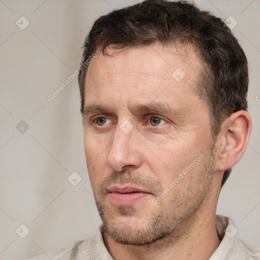 Neutral white adult male with short  brown hair and brown eyes