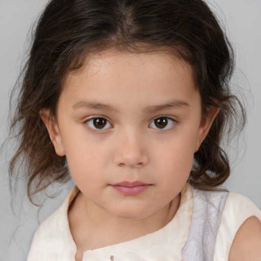 Neutral white child female with medium  brown hair and brown eyes