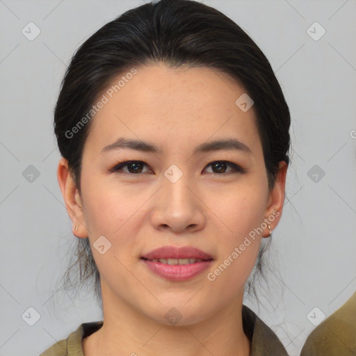 Joyful asian young-adult female with medium  brown hair and brown eyes