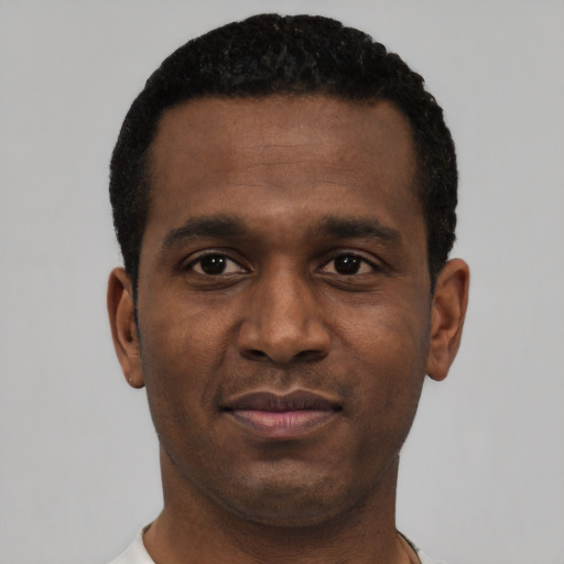 Neutral black young-adult male with short  black hair and brown eyes