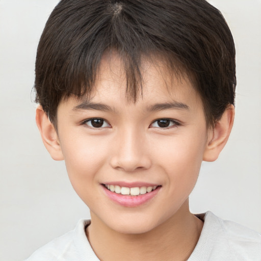 Joyful white child female with short  brown hair and brown eyes