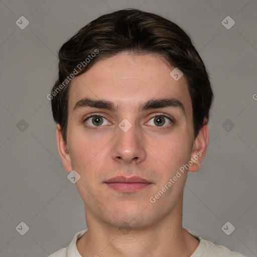 Neutral white young-adult male with short  brown hair and grey eyes