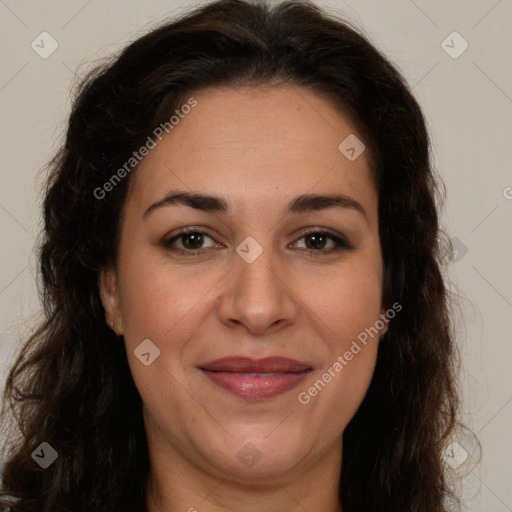 Joyful white adult female with long  brown hair and brown eyes