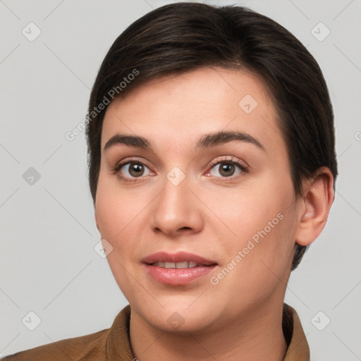 Joyful white young-adult female with short  brown hair and brown eyes